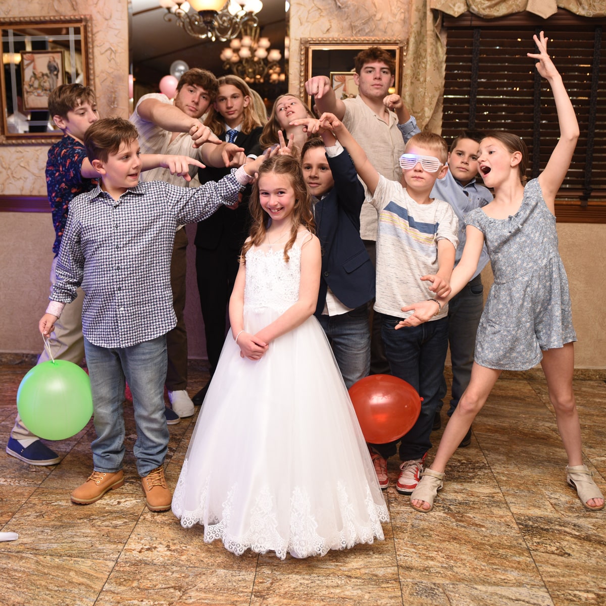 Kids posing at a First Holy Communion Party